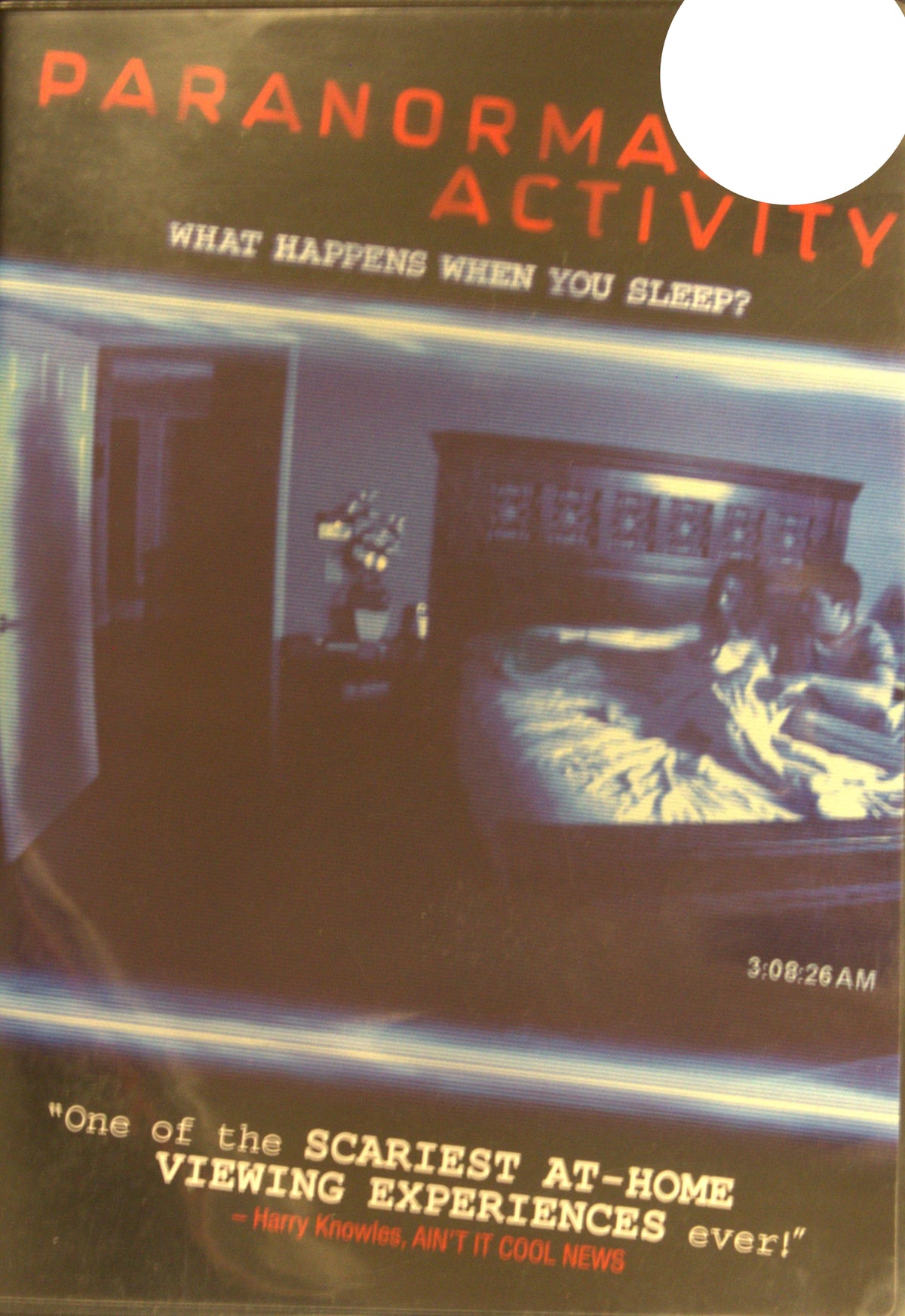 Paranormal Activity (2009) DVD – omslag