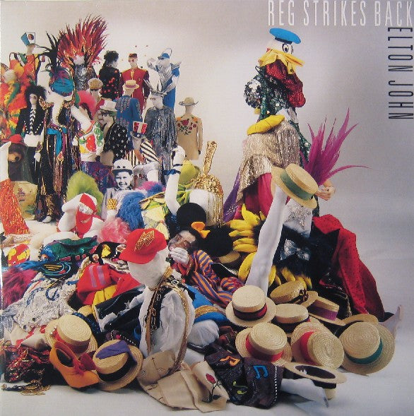 ELTON JOHN - REG STRIKES BACK