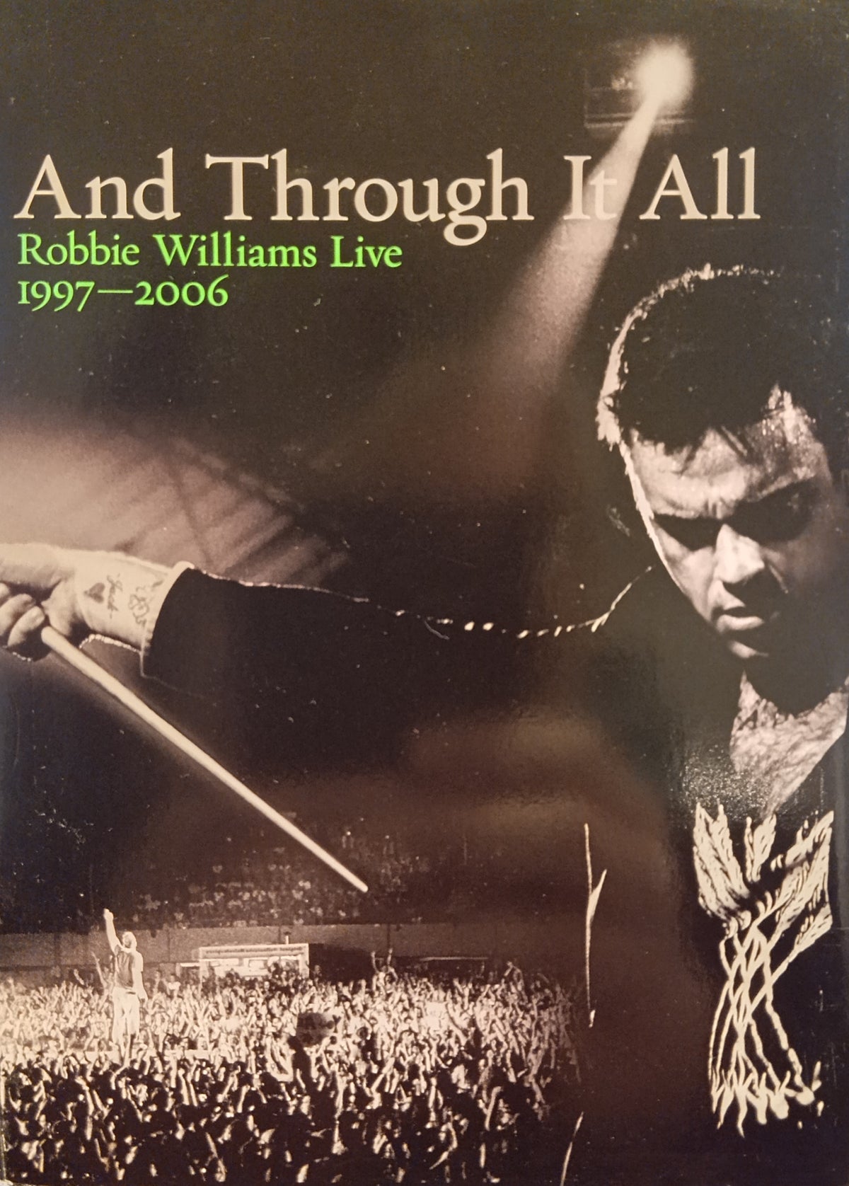 And Through It All – Robbie Williams Live 1997–2006 (2006) DVD – omslag